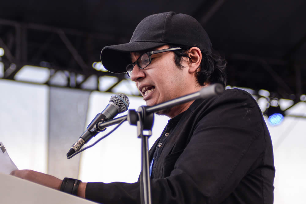 Lectura de  Oscar Saavedra (Chile). © #25FIPM. Photo: Sara Marin
