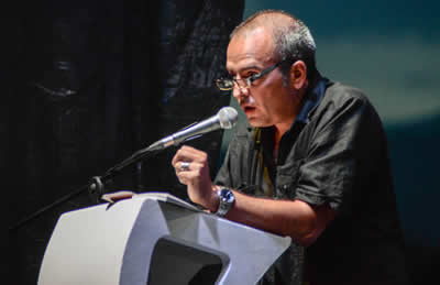 Lectura de Jesús David Curbelo (Cuba). © #25FIPM. Photo: Sara Marin