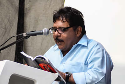 Lectura de Jairo Guzmán (Colombia). © #25FIPM. Photo: Sara Marin